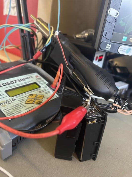 BMS board with soldering equipment during Mavic Air FET repair